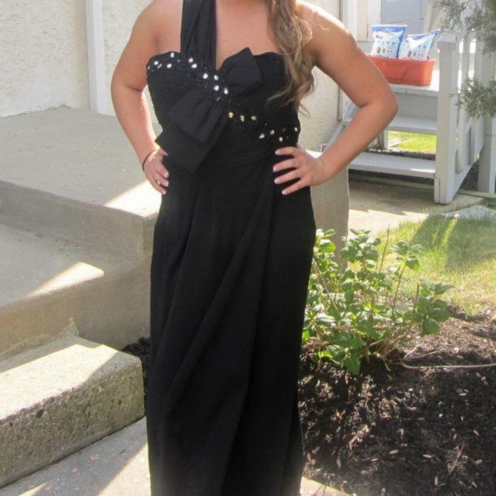 one shoulder ball gown with bow embellishment